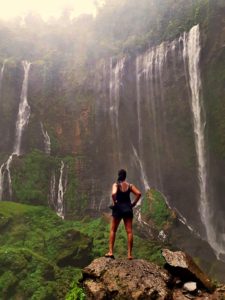 tumpak sewu waterfall standing at Tumpak Sewu Waterfall canyon valley